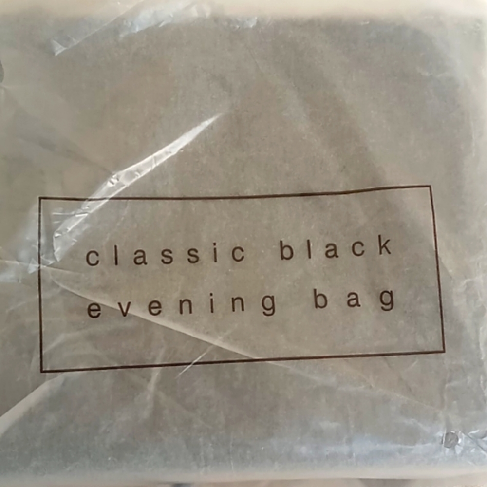 Avon Products classic black evening bag
